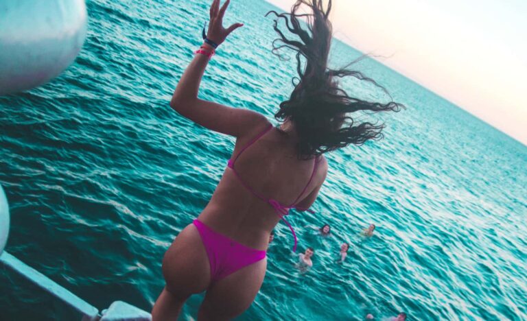 Tidal Zante Boat Party girl jumping in the water